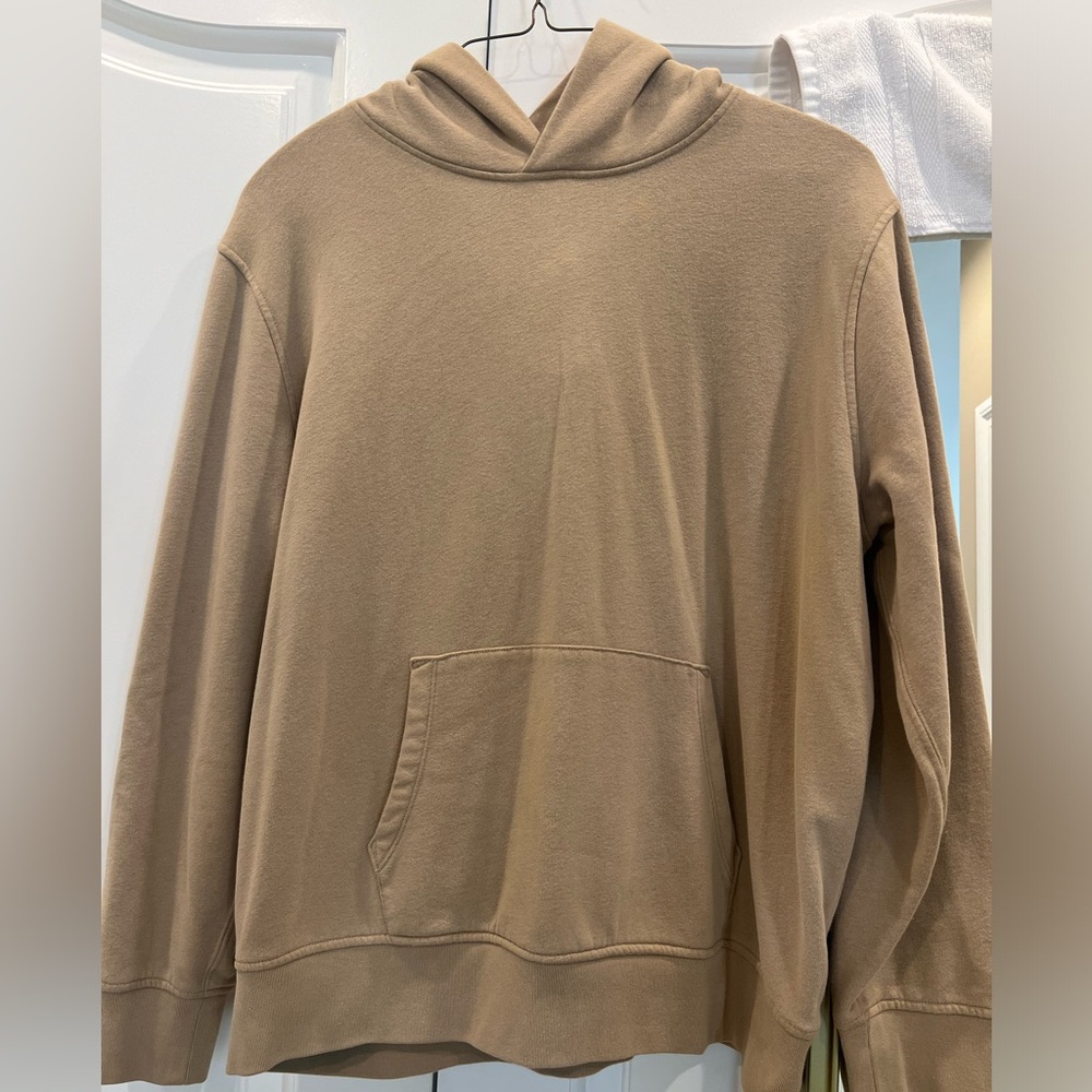 Man’s tan color Gap hoodie